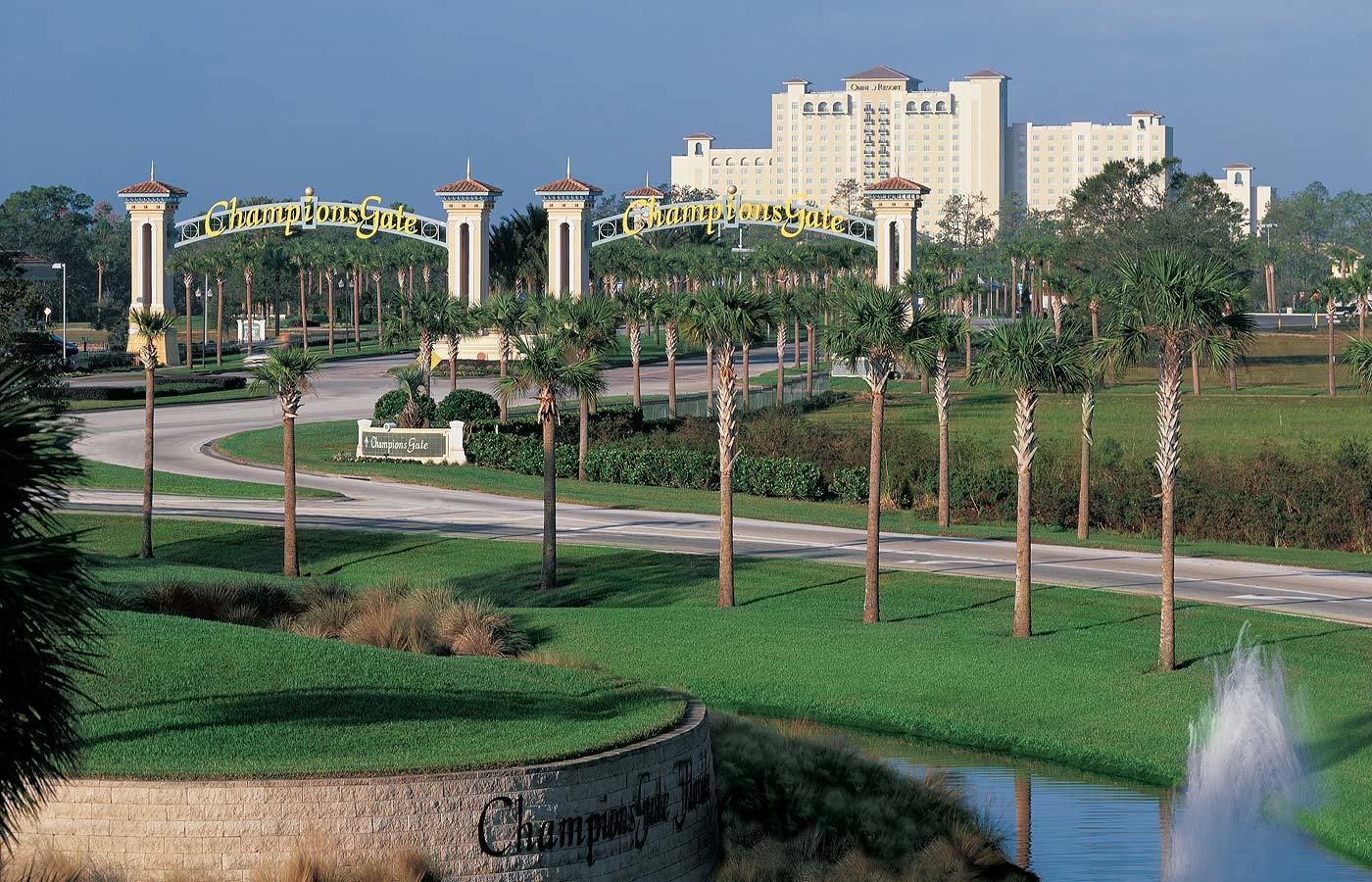championsgate entrance with arch and hotel